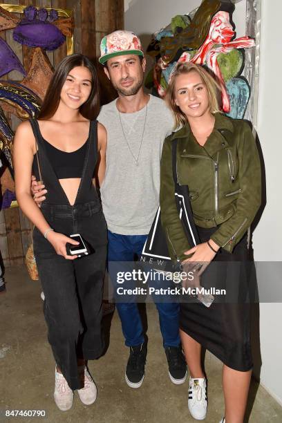 Caroline Churchill, Ori Carino and Anna Virovka attend IV New York Gallery Grand Opening Exhibition on September 14, 2017 in New York City.