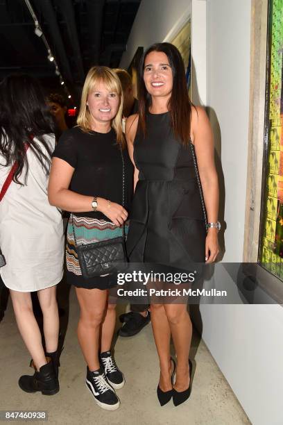 Amber Sherman and Francis Cardoso attend IV New York Gallery Grand Opening Exhibition on September 14, 2017 in New York City.