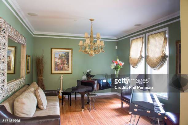 Nutritionist Joy Bauer's home is photographed for Closer Weekly Magazine on May 12, 2017 in New York. Music room. PUBLISHED IMAGE.