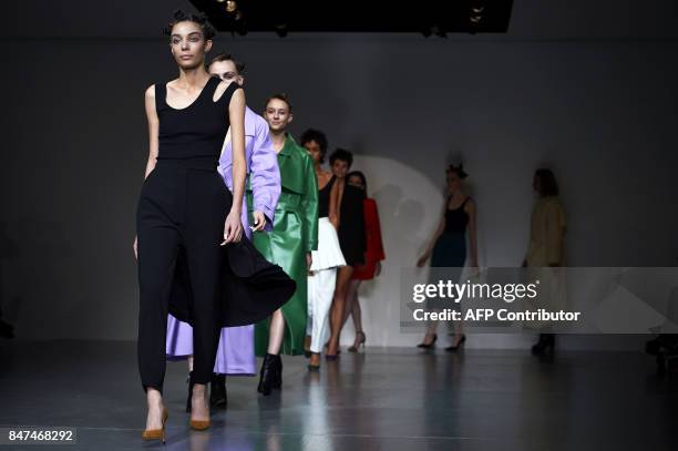 Models present creations by Polish born designer Marta Jakubowski during a catwalk show for her Spring/Summer 2018 collection on the first day of...