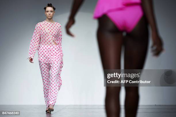 Models present creations by Polish born designer Marta Jakubowski during a catwalk show for her Spring/Summer 2018 collection on the first day of...