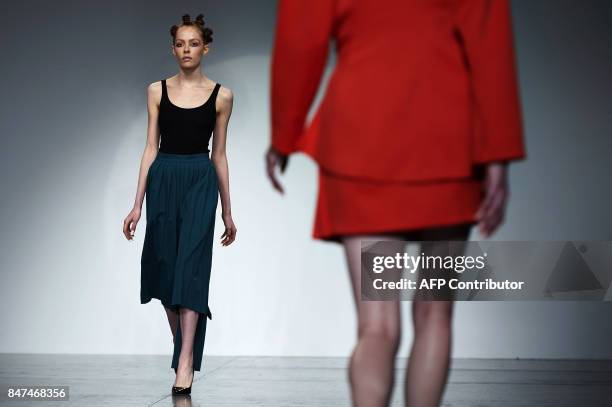 Models present creations by Polish born designer Marta Jakubowski during a catwalk show for her Spring/Summer 2018 collection on the first day of...