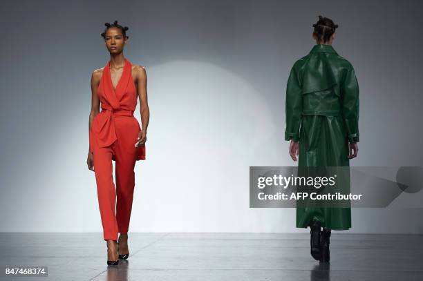 Models present creations by Polish born designer Marta Jakubowski during a catwalk show for her Spring/Summer 2018 collection on the first day of...