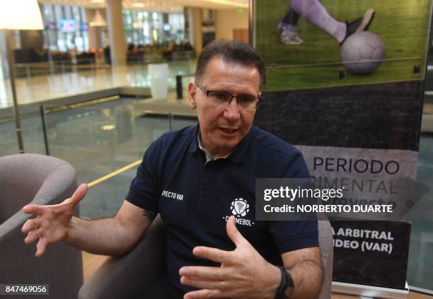 S referee instructor and Conmebol's director of referees, Brazilian Wilson Luiz Seneme, speaks during an interview with AFP before the beginning of a...