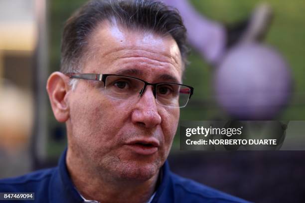 S referee instructor and Conmebol's director of referees, Brazilian Wilson Luiz Seneme, speaks during an interview with AFP before the beginning of a...