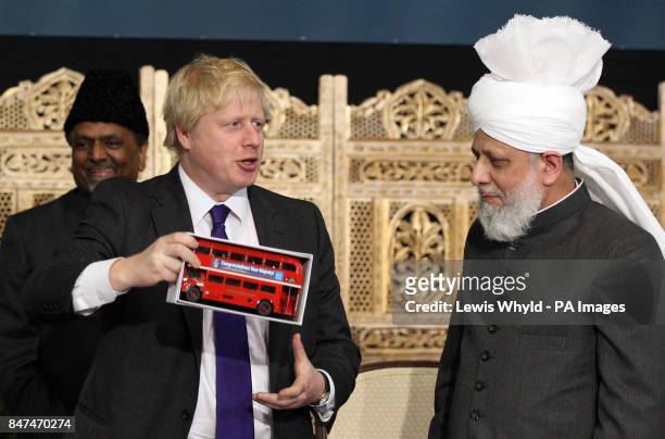 Standalone: London Mayor Boris Johnson meets worshippers as he visits Europe as he visits Europe's biggest mosque, the Baitul Futuh Mosque, in...