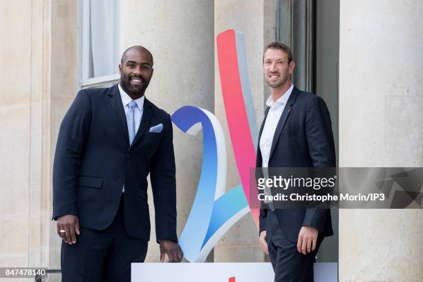 French Olympic Judo champion Teddy Riner and French Olympic Champion Alain Bernard arrive to celebrate Paris being announced as the host of the 2024...