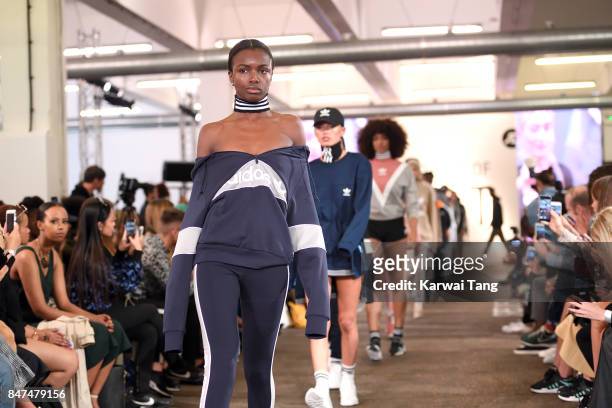Leomie Anderson walks the runway during the Streets of EQT Fashion Show at The Old Truman Brewery on September 15, 2017 in London, England. Hailey...