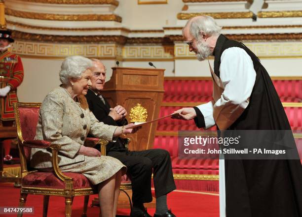 Queen Elizabeth II accompanied by the Duke of Edinburgh receives a copy of the loyal address from the Archbishop of Canterbury Dr Rowan Williams,...