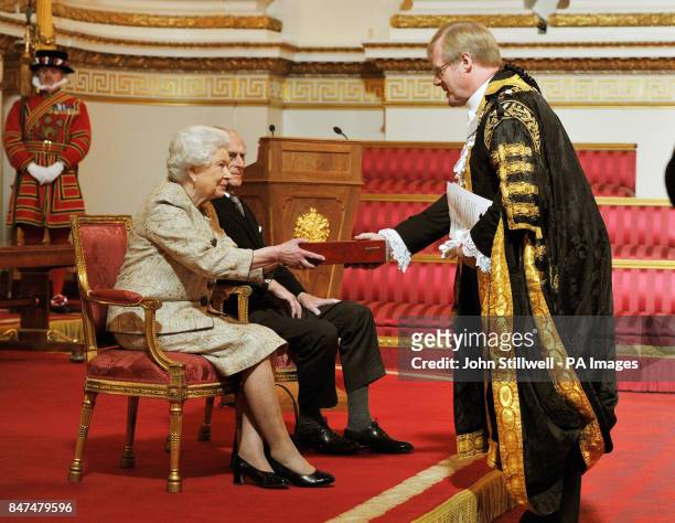 Queen Elizabeth II accompanied by the Duke of Edinburgh receives a copy of the loyal address from the Lord Mayor of London Alderman David Wotton,...