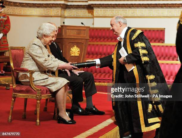 Queen Elizabeth II accompanied by the Duke of Edinburgh receives a copy of the loyal address from the University of Glasgow Chancellor Sir Kenneth...