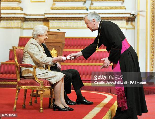 Queen Elizabeth II accompanied by the Duke of Edinburgh receives a copy of the loyal address from the Roman Catholic Church of England and Wales...