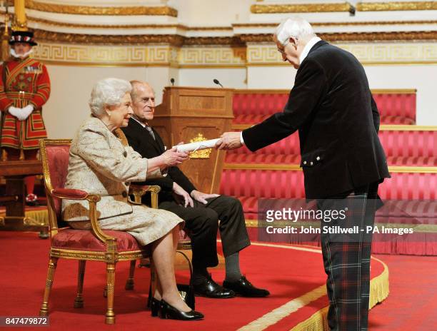 Queen Elizabeth II accompanied by the Duke of Edinburgh receives a copy of the loyal address from the Lord Provost Lord Lieutenant of Edinburgh...