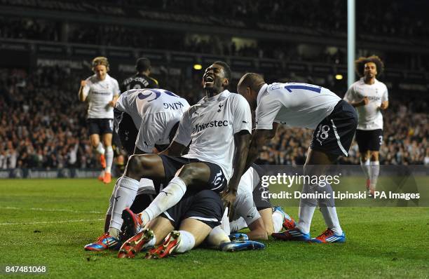 Tottenham Hotspur's Ryan Nelsen celebrates scoring his sides's first goal of the game with teammates