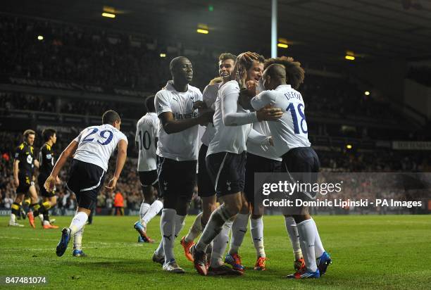 Tottenham Hotspur's Ryan Nelsen celebrates scoring his sides's first goal of the game with teammates
