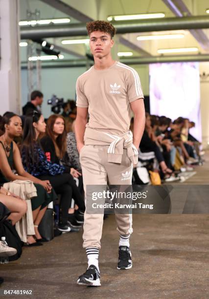 Model walks the runway during the Streets of EQT Fashion Show at The Old Truman Brewery on September 15, 2017 in London, England. Hailey Baldwin...