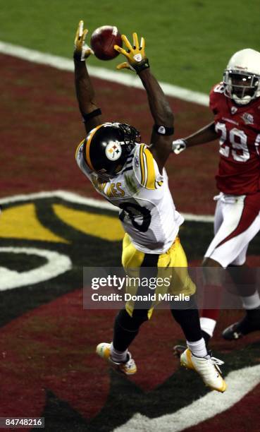 Wide Receiver Santonio Holmes of the Pittsburgh Steelers jumps up for a pass in the endzone against Rogers-Cromartie of the Arizona Cardinals during...