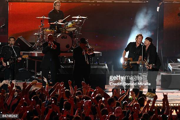 Bruce Springsteen and the E Street Band perform at the Bridgestone Halftime Show during Super Bowl XLIII between the Arizona Cardinals and the...