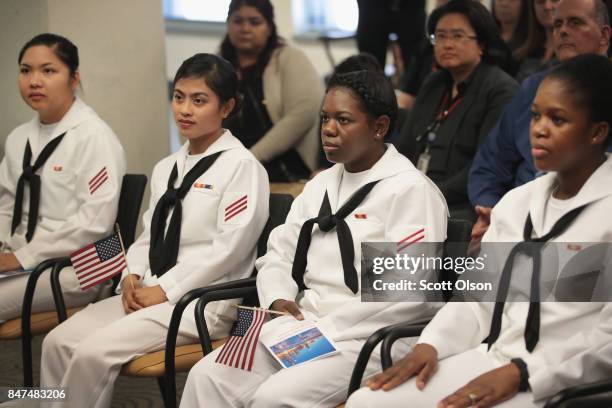 Sailors, currently serving in the U.S. Navy at Naval Station Great Lakes, are sworn in as U.S. Citizens during a ceremony on September 15, 2017 in...