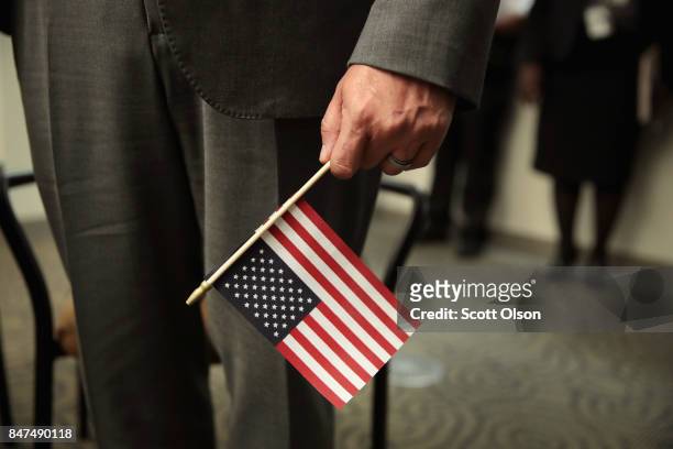 Marine veteran Hector Alfaro, who was three years old when he arrived in the United States, is sworn in as U.S. Citizens during a ceremony on...