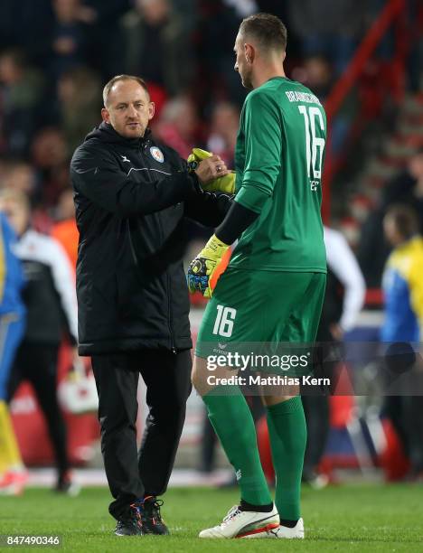 Head coach Torsten Lieberknecht of Braunschweig and goalkeeper Jasmin Fejzic look on after the Second Bundesliga match between 1. FC Union Berlin and...