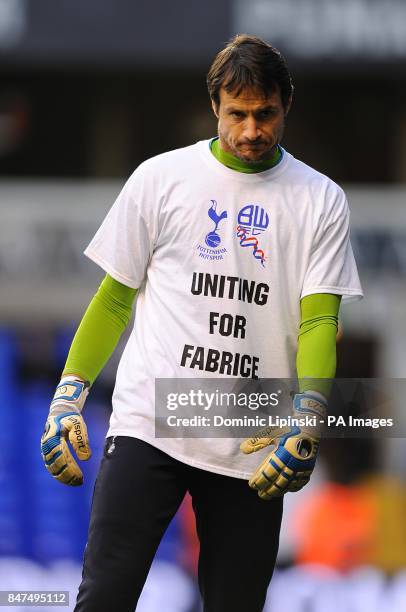 Tottenham Hotspur goalkeeper Carlo Cudicini warms up wearing a t-shirt in support of Bolton Wanderers' Fabrice Muamba