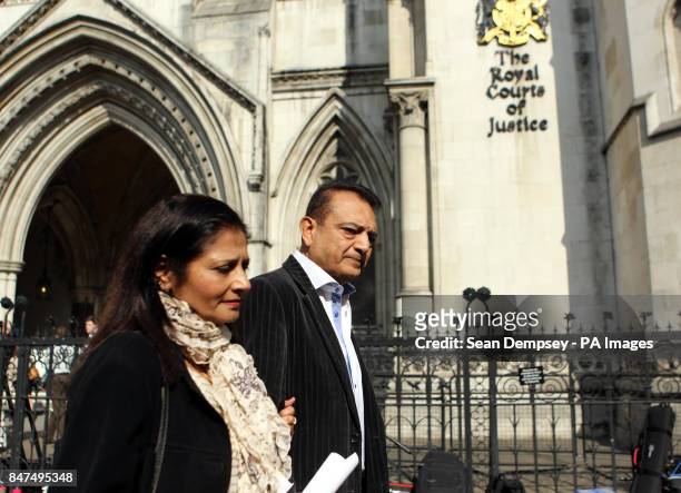 The parents of Anni Dewani, father Vinod Hindocha and wife Nilam arrive at the High Court in London today where two judges ruled that it would be...
