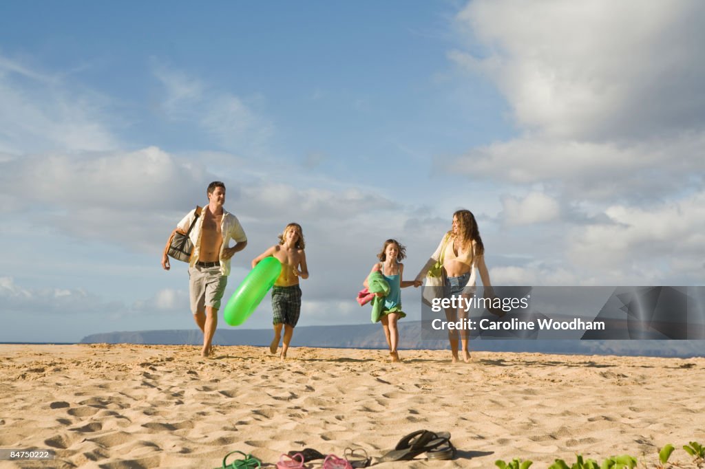 Family walking on the beach