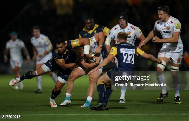 Ben Te'o of Worcester puts a high tackle in on Sam Simmonds of Exeter during the Aviva Premiership match between Worcester Warriors and Exeter Chiefs...