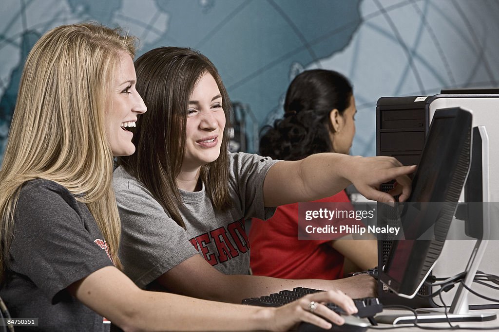 College Students Working Together On Computers High-Res Stock Photo ...
