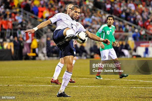 Oguchi Onyewu of Team USA kicks the ball out of trouble against Mexico during their FIFA World Cup qualifying match on February 11, 2009 at Columbus...