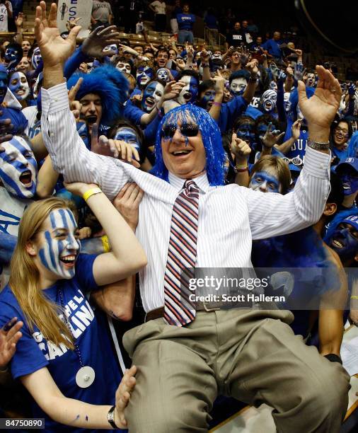 The Cameron Crazies of Duke clown around with Dick Vitale of ESPN before they face the North Carolina Tar Heels on February 11, 2009 at Cameron...