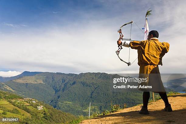 archery competition, bumthang, bhutan - bumthang fotografías e imágenes de stock