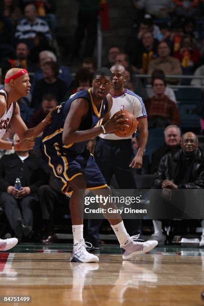 Roy Hibbert of the Indiana Pacers posts up against Charlie Villanueva of the Milwaukee Bucks on February 11, 2009 at the Bradley Center in Milwaukee,...