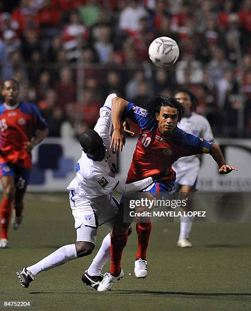 Oscar Garcia of Honduras and Walter Centeno of Costa Rica fight for the ball on February 11, 2009 during their World Cup South Africa 2010 qualifier...