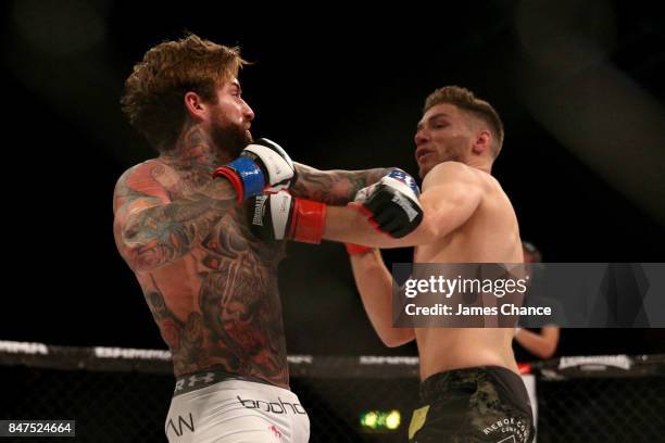 Aaron Chalmers of England in action against Alex Thompson of England in their Welterweight fight during BAMMA 31 at SSE Arena Wembley on September...