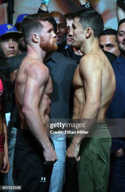 Boxer Canelo Alvarez and WBC, WBA and IBF middleweight champion Gennady Golovkin face off during their official weigh-in at MGM Grand Garden Arena on...