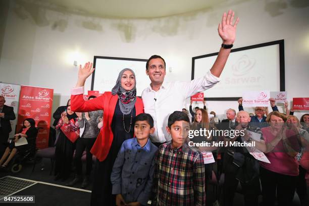 Anas Sarwar is seen on stage with his family at the launch of his campaign to be Scottish Labour leader at the Gorbals Parish Church on September 15,...