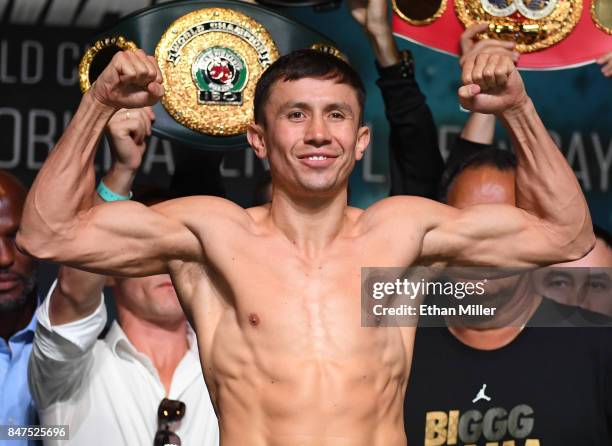 And IBF middleweight champion Gennady Golovkin poses on the scale during his official weigh-in at MGM Grand Garden Arena on September 15, 2017 in Las...