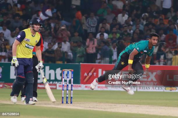 Pakistani bowler Hassan Ali delivers the ball during the third and final Twenty20 International match between the World XI and Pakistan at the...