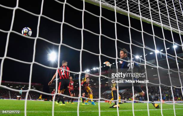 Solly March of Brighton and Hove Albion beats goalkeeper Asmir Begovic of AFC Bournemouth to score their first goal during the Premier League match...