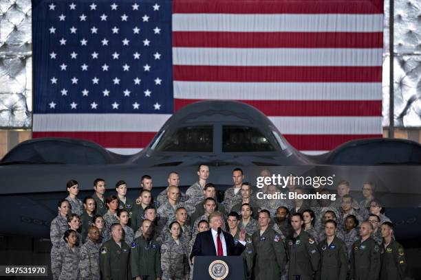 President Donald Trump delivers remarks to military personnel and families in an aircraft hangar at Joint Base Andrews, Maryland, U.S., on Friday,...