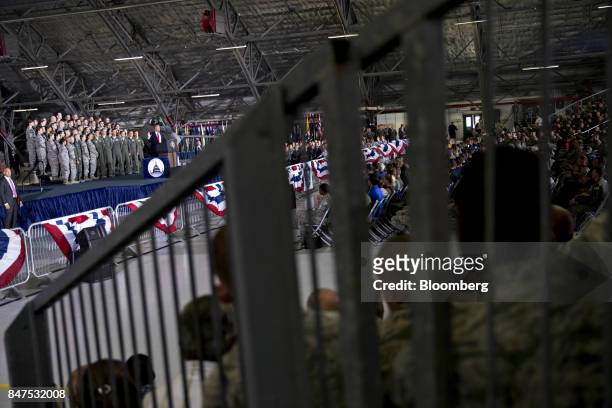 President Donald Trump, top center, delivers remarks to military personnel and families in an aircraft hangar at Joint Base Andrews, Maryland, U.S.,...