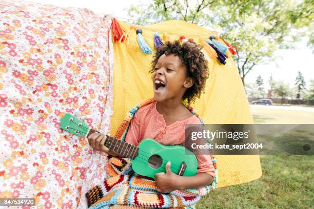 outdoor art lesson for kids - children holding musical instruments stock pictures, royalty-free photos & images