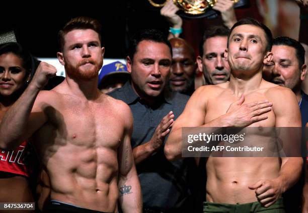 Boxers Canelo Alvarez and Gennady Golovkin pose during their weigh-in at the MGM Grand Hotel & Casino on September 15, 2017 in Las Vegas, Nevada....