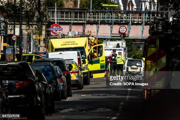 Emergency services attend to the scene near Parsons Green Underground Station. Several people have been injured after an explosion on a tube train in...
