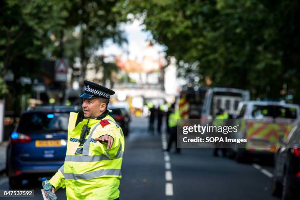 Police officers stand by a cordon at Parsons Green Underground Station. Several people have been injured after an explosion on a tube train in...
