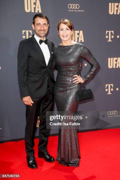 German actress Anja Kling and her boyfriend Oliver Haas attend the UFA 100th anniversary celebration at Palais am Funkturm on September 15, 2017 in...