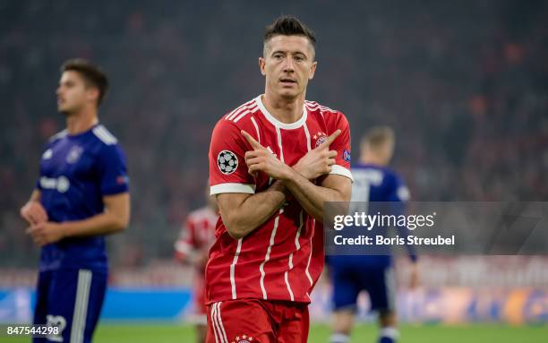 Robert Lewandowski of FC Bayern Muenchen celebrates after scoring his team's first goal during the UEFA Champions League group B match between Bayern...