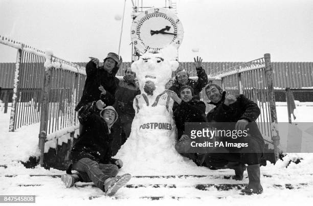 Billy O'Connor, his son Pat, Steve Phillipson and son Wayne, Pat Galligan and Jimmy Rosie, all groundsmen at Highbury stadium with a snowman that...